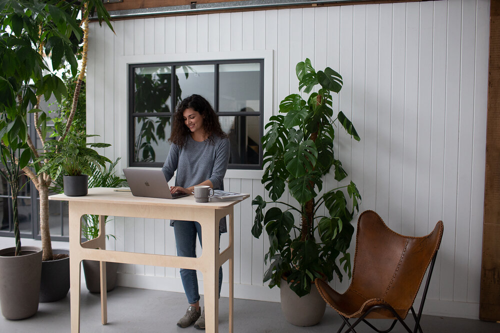 woman working at standing desk